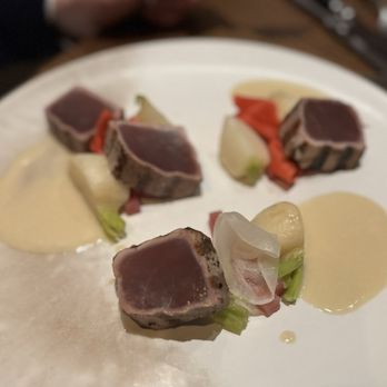 Sidney Street Cafe signature dishes  Menu changes seasonally, but often features dishes like Seared Scallops, various preparations of prime meats, inventive pasta dishes, and decadent desserts. Known for its consistent quality and creativity.